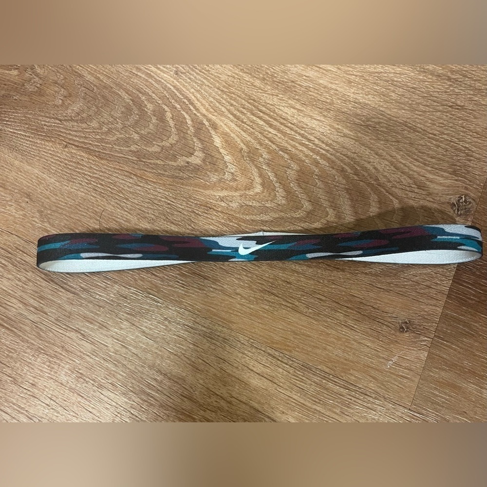 Nike purple, black, white, purple, and teal thin pattern headband​​​​​​​